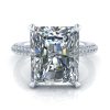 Radiant Cut Moissanite Engagement Ring #GTJ3902-radiant-fo-w Radiant Cut Moissanite Diamond Ring with under halo and pave set shank #GTJ3902-radiant-fo-w photographed on reflective acrylic