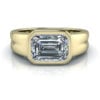 East West Bezel Set Emerald Cut Engagement Ring #GTJ3889-emerald-y Bezel set emerald ring in grooved yellow gold ring shank.