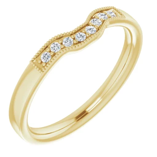 Vintage contour wedding ring with diamonds in 14k yellow gold.