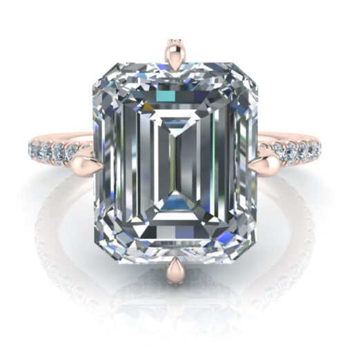 3.50 Carat emerald cut diamond ring accented by a hidden halo set in 14k rose gold.